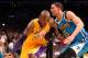 LOS ANGELES, CA - JANUARY 29: Kobe Bryant #24 of the Los Angeles Lakers drives around Austin Rivers #25 of the New Orleans Hornets at Staples Center on January 29, 2013 in Los Angeles, California. . The Lakers won 111-106. NOTE TO USER: User expressly acknowledges and agrees that, by downloading and or using this photograph, User is consenting to the terms and conditions of the Getty Images License Agreement. (Photo by Stephen Dunn/Getty Images)