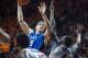 Feb 21, 2013; Blacksburg, VA, USA; Duke Blue Devils forward Mason Plumlee (5) shoots the ball over Virginia Tech Hokies forward Cadarian Raines (4) during the first half at Cassell Coliseum. Mandatory Credit: Peter Casey-USA TODAY Sports