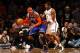 NEW YORK, NY - DECEMBER 11: Carmelo Anthony #7 of the New York Knicks dribbles against Joe Johnson #7 of the Brooklyn Nets during their game at the Barclays Center on December 11, 2012 in the Brooklyn borough of New York City. NOTE TO USER: User expressly acknowledges and agrees that, by downloading and/or using this photograph, user is consenting to the terms and conditions of the Getty Images License Agreement. (Photo by Al Bello/Getty Images)
