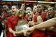 LOUISVILLE, KY - MARCH 09: Luke Hancock #11 and Peyton Siva #3 of the Louisville Cardinals celebrate and hold the Big East Conference Regular Sean Championship trophy after beating the Notre Dame Fighting Irish at KFC YUM! Center on March 9, 2013 in Louisville, Kentucky. (Photo by Andy Lyons/Getty Images)