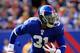 EAST RUTHERFORD, NJ - OCTOBER 16: Aaron Ross #31 of the New York Giants runs the ball against the Buffalo Bills during the first half at MetLife Stadium on October 16, 2011 in East Rutherford, New Jersey. (Photo by Chris Trotman/Getty Images)