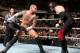 CM Punk assaults Kane with a steel chair. (Courtesy of WWE.com)