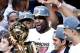 Jun 21, 2012; Miami, FL, USA; Miami Heat small forward LeBron James (6) celebrates with the Larry O'Brien Trophy after winning the NBA championship in game five of the 2012 NBA Finals against the Oklahoma City Thunder at the American Airlines Arena. Miami won 121-106. Mandatory Credit: Derick E. Hingle-USA TODAY Sports