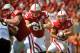 LINCOLN, NE - SEPTEMBER 1: Running back Rex Burkhead #22 of the Nebraska Cornhuskers follows offensive linesman Spencer Long #61 to the endzone during their game against Southern Miss Golden Eagles at Memorial Stadium September 1, 2012 in Lincoln, Nebraska. Burkhead suffered slight knee injury during the game. Nebraska won 40-20. (Photo by Eric Francis/Getty Images)