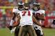 TAMPA, FL - AUGUST 27: Defensive lineman Michael Bennett #71 of the Tampa Bay Buccaneers celebrates a sack against the Miami Dolphins during a preseason game at Raymond James Stadium on August 27, 2011 in Tampa, Florida. (Photo by J. Meric/Getty Images)