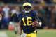 ANN ARBOR, MI - OCTOBER 20: Denard Robinson #16 of the Michigan Wolverines runs 44 yards during the the fourth quarter of the game against the Michigan State Spartans at Michigan Stadium on October 20, 2012 in Ann Arbor, Michigan. The Wolverines defeated the Spartans 12-10. (Photo by Leon Halip/Getty Images)
