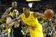 March 3, 2013; Ann Arbor, MI, USA; Michigan Wolverines guard Trey Burke (3) moves the ball on Michigan State Spartans guard Travis Trice (20) in the first half at Crisler Center. Mandatory Credit: Rick Osentoski-USA TODAY Sports