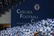 LONDON, ENGLAND - APRIL 18: Chelsea fans wave club flags during the UEFA Champions League Semi Final first leg match between Chelsea and Barcelona at Stamford Bridge on April 18, 2012 in London, England. (Photo by Michael Regan/Getty Images)