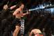 Mar 16, 2013; Montreal, Quebec, CAN; Jake Ellenberger (red) celebrates after defeating Nate Marquardt (blue) in their main card bout at UFC 158 at the Bell Centre. Mandatory Credit: Eric Bolte-USA TODAY Sports
