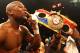 LAS VEGAS, NV - MAY 05: Floyd Mayweather Jr. celebrates after defeating Miguel Cotto by unanimous decision during their WBA super welterweight title fight at the MGM Grand Garden Arena on May 5, 2012 in Las Vegas, Nevada. (Photo by Al Bello/Getty Images)