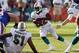 Dec 23, 2012; Miami Gardens, FL, USA; Miami Dolphins running back Reggie Bush (22) runs the ball against the Buffalo Bills in the second half at Sun Life Stadium. Mandatory Credit: Robert Mayer-USA TODAY Sports