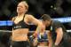 Feb 23, 2013; Anaheim, CA, USA; Ronda Rousey reacts after defeating Liz Carmouche during their UFC women's world bantamweight championship bout at the Honda Center. Mandatory Credit: Jayne Kamin-Oncea-USA TODAY Sports