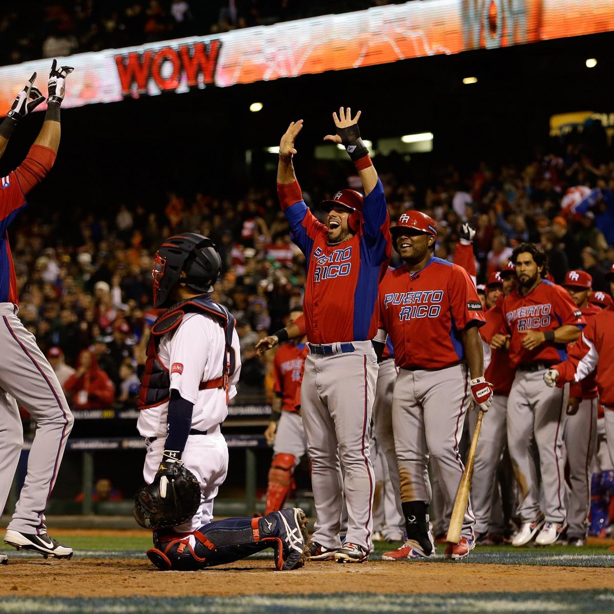 Puerto Rico's catcher Yadier Molina (4) chases down Japan's