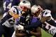 BALTIMORE, MD - SEPTEMBER 23: Torrey Smith (C) #82 of the Baltimore Ravens is tackled by Steve Gregory #28 and Devin McCourty #32 (R) of the New England Patriots at M&T Bank Stadium on September 23, 2012 in Baltimore, Maryland. (Photo by Patrick Smith/Getty Images)