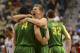 March 16, 2013; Las Vegas, NV, USA; Oregon Ducks forward E.J. Singler (25, right) and forward Arsalan Kazemi (14) celebrate after the championship game of the Pac 12 tournament against the UCLA Bruins at the MGM Grand Garden Arena. Oregon defeated UCLA 78-69. Mandatory Credit: Kyle Terada-USA TODAY Sports
