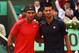 PARIS, FRANCE - JUNE 10: Rafael Nadal (L) of Spain and Novak Djokovic of Serbia pose at the net before the men's singles final on day 15 of the French Open at Roland Garros on June 10, 2012 in Paris, France. (Photo by Clive Brunskill/Getty Images)