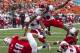Dec 24, 2012; Honolulu, HI, USA; Southern Methodist Mustangs running back Zach Line (48) rolls under Fresno State Bulldogs strong safety Phillip Thomas (16) into the end zone for a touchdown during the second quarter of the Hawaii Bowl at Aloha Stadium. Mandatory Credit: Marco Garcia-USA TODAY Sports