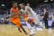 Mar 15, 2013; Kansas City, MO, USA; Kansas State Wildcats guard Rodney McGruder (22) drives around Oklahoma State guard Le