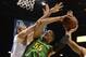 March 16, 2013; Las Vegas, NV, USA; Oregon Ducks center Tony Woods (55) shoots against the UCLA Bruins during the first half of the championship game of the Pac 12 tournament at the MGM Grand Garden Arena. Mandatory Credit: Kyle Terada-USA TODAY Sports