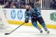 Feb 26, 2013; San Jose, CA, USA; San Jose Sharks defenseman Dan Boyle (22) collects the puck during the first period of the game against the Colorado Avalanche at HP Pavilion. Mandatory Credit: Ed Szczepanski-USA TODAY Sports