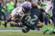 SEATTLE, WA - NOVEMBER 04: Running back Marshawn Lynch #24 of the Seattle Seahawks is tackled by middle linebacker Jasper Brinkley #54 of the Minnesota Vikings at CenturyLink Field on November 4, 2012 in Seattle, Washington. (Photo by Otto Greule Jr/Getty Images)