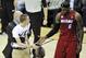 Mar 20, 2013; Cleveland, OH, USA; A Cleveland Cavaliers fan shakes LeBron James' hand after running on to the court during a game against the Cleveland Cavaliers at Quicken Loans Arena. Mandatory Credit: David Richard-USA TODAY Sports