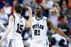 LEXINGTON, KY - MARCH 21: Rotnei Clarke #15 and Roosevelt Jones #21 of the Butler Bulldogs show camaraderie in the second half against the Bucknell Bison during the second round of the 2013 NCAA Men's Basketball Tournament at the Rupp Arena on March 21, 2013 in Lexington, Kentucky. Butler won 68-56. (Photo by Andy Lyons/Getty Images)