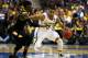 AUBURN HILLS, MI - MARCH 23: Trey Burke #3 of the Michigan Wolverines drives in the first half against Briante Weber #2 of the Virginia Commonwealth Rams during the third round of the 2013 NCAA Men's Basketball Tournament at The Palace of Auburn Hills on March 23, 2013 in Auburn Hills, Michigan. (Photo by Jonathan Daniel/Getty Images)