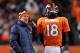 DENVER, CO - JANUARY 12: Head coach John Fox of the Denver Broncos talks with quarterback Peyton Manning #18 against the Baltimore Ravens during the AFC Divisional Playoff Game at Sports Authority Field at Mile High on January 12, 2013 in Denver, Colorado. The Ravens won 38-35 in 2 overtimes. (Photo by Dustin Bradford/Getty Images)