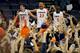 CHARLOTTESVILLE, VA - FEBRUARY 28: Joe Harris #12, Justin Anderson #23 and Teven Jones #5 of the Virginia Cavaliers celebrate following a victory against the Duke Blue Devils at John Paul Jones Arena on February 28, 2013 in Charlottesville, Virginia. Virginia defeated Duke 73-68. (Photo by Lance King/Getty Images)