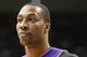 Feb 25, 2013; Denver, CO, USA; Los Angeles Lakers center Dwight Howard (12) warms up before the first half against the Denver Nuggets at the Pepsi Center. The Nuggets won 119-108. Mandatory Credit: Chris Humphreys-USA TODAY Sports