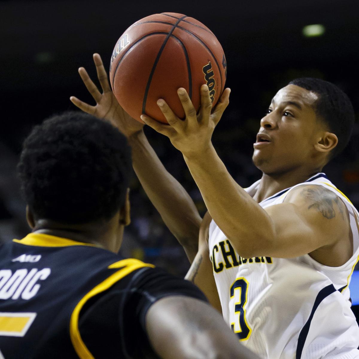 Ncaa Tournament Picks Kansas Jayhawks Vs Michigan Wolverines