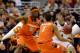Two Syracuse players trap Indiana's Jordan Hulls in the loss