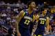 WASHINGTON, DC - MARCH 28: Vander Blue #13 of the Marquette Golden Eagles reacts after a dunk against the Miami (Fl) Hurricanes during the East Regional Round of the 2013 NCAA Men's Basketball Tournament at Verizon Center on March 28, 2013 in Washington, DC. (Photo by Rob Carr/Getty Images)