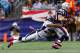 FOXBORO, MA - OCTOBER 07: Wes Welker #83 of the New England Patriots runs with the ball after catching a pass in front of Chris Harris #25 of the Denver Broncos during the game on October 7, 2012 at Gillette Stadium in Foxboro, Massachusetts. (Photo by Jared Wickerham/Getty Images)