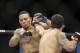 Dec 8, 2012, Seattle, WA, USA; Raphael Assuncao fights Mike Easton, left, during their third round bantamweight bout at MMA on FOX 5 at Key Arena. Mandatory Credit: Joe Nicholson-USA TODAY Sports