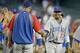 PHOENIX, AZ - SEPTEMBER 30: Starlin Castro #13 of the Chicago Cubs is congratulated by manager Dale Sveum #33 following a 7-2 victory over the Arizona Diamondbacks during a MLB game at Chase Field on September 30, 2012 in Phoenix, Arizona. (Photo by Ralph Freso/Getty Images)