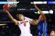 ARLINGTON, TX - MARCH 29: Scottie Wilbekin #5 of the Florida Gators goes up against Sherwood Brown #25 of the Florida Gulf Coast Eagles during the South Regional Semifinal round of the 2013 NCAA Men's Basketball Tournament at Dallas Cowboys Stadium on March 29, 2013 in Arlington, Texas. (Photo by Ronald Martinez/Getty Images)