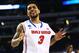 ARLINGTON, TX - MARCH 29: Mike Rosario #3 of the Florida Gators celebrates their 62 to 50 win over the Florida Gulf Coast Eagles during the South Regional Semifinal round of the 2013 NCAA Men's Basketball Tournament at Dallas Cowboys Stadium on March 29, 2013 in Arlington, Texas. (Photo by Ronald Martinez/Getty Images)