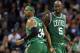 CHARLOTTE, NC - FEBRUARY 11: Teammates Paul Pierce #34 and Kevin Garnett #5 of the Boston Celtics react after a basket against the Charlotte Bobcats during their game at Time Warner Cable Arena on February 11, 2013 in Charlotte, North Carolina. NOTE TO USER: User expressly acknowledges and agrees that, by downloading and or using this photograph, User is consenting to the terms and conditions of the Getty Images License Agreement. (Photo by Streeter Lecka/Getty Images)