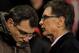 LIVERPOOL, ENGLAND - JANUARY 25: Liverpool owner John Henry talks to Liverpool Director of Football Damien Comolli (L) prior to the Carling Cup Semi Final Second Leg match between Liverpool and Manchester City at Anfield on January 25, 2012 in Liverpool, England. (Photo by Michael Regan/Getty Images)