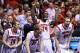 INDIANAPOLIS, IN - MARCH 31: (L-R) Logan Baumann #14, Tim Henderson #15, Montrezl Harrell #24 and Stephan Van Treese #44 of the Louisville Cardinals celebrate on the bench against the Duke Blue Devils during the Midwest Regional Final round of the 2013 NCAA Men's Basketball Tournament at Lucas Oil Stadium on March 31, 2013 in Indianapolis, Indiana. (Photo by Streeter Lecka/Getty Images)