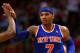 MIAMI, FL - APRIL 02: Carmelo Anthony #7 of the New York Knicks high fives teammates during a game against the Miami Heat at American Airlines Arena on April 2, 2013 in Miami, Florida. NOTE TO USER: User expressly acknowledges and agrees that, by downloading and or using this photograph, User is consenting to the terms and conditions of the Getty Images License Agreement. (Photo by Mike Ehrmann/Getty Images)