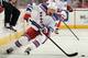 NEWARK, NJ - MARCH 19: Marian Gaborik #10 of the New York Rangers takes the puck in the first period against the New Jersey Devils at the Prudential Center on March 19, 2013 in Newark, New Jersey. (Photo by Elsa/Getty Images)