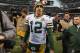 CHICAGO, IL - DECEMBER 16: Aaron Rodgers #12 of the Green Bay Packers walks off of the field after a win against the Chicago Bears at Soldier Field on December 16, 2012 in Chicago, Illinois. The Packers defeated the Bears 21-13. (Photo by Jonathan Daniel/Getty Images)