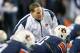 AUBURN, AL - NOVEMBER 10: Head coach Gene Chizik of the Auburn Tigers speaks to his players while warming up before their game against the Georgia Bulldogs on November 10, 2012 at Jordan-Hare Stadium in Auburn, Alabama. Georgia defeated Auburn 38-0 and clinched the SEC East division. (Photo by Michael Chang/Getty Images)