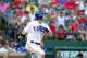 July 30, 2012; Arlington, TX, USA; Texas Rangers outfielder Josh Hamilton (32) hits a home run in the fourth inning against the Los Angeles Angels at Rangers Ballpark. Mandatory Credit: Matthew Emmons-USA TODAY Sports