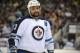 PITTSBURGH, PA - FEBRUARY 28: Dustin Byfuglien #33 of the Winnipeg Jets looks on near the end of a Pittsburgh Penguins 4-0 victory on February 28, 2013 at the CONSOL Energy Center in Pittsburgh, Pennsylvania. (Photo by Vincent Pugliese/ Getty Images)