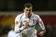 LONDON, ENGLAND - APRIL 04: Gareth Bale of Tottenham Hotspur runs with the ball during the UEFA Europa League quarter-final first leg between Tottenham Hotspur FC and FC Basel 1893 at White Hart Lane on April 4, 2013 in London, England. (Photo by Paul Gilham/Getty Images)