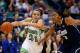 Mar 12, 2013; Hartford, CT, USA; Notre Dame Fighting Irish guard Kayla McBride (21) drives the ball against Connecticut Huskies forward Morgan Tuck (3) in the second half during the championship game of the Big East tournament at the XL Center. The Notre Dame Fighting Irish defeated the Connecticut Huskies 61-59. Mandatory Credit: David Butler II-USA TODAY Sports